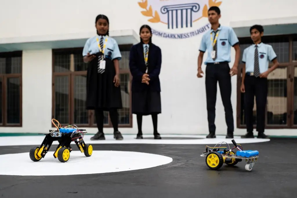 Students demonstrating robotics projects